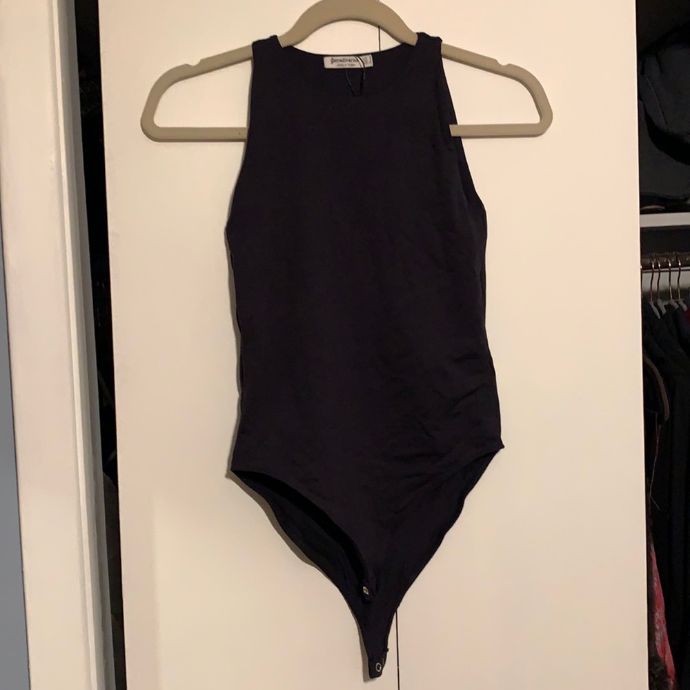 Black bodysuit. Literally never worn